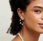 Model is wearing the Kinsley Earrings in 14K Yellow Gold